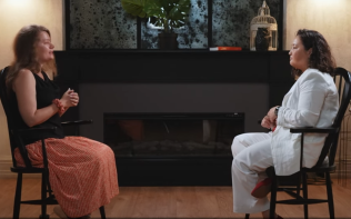 two women sitting opposite each other